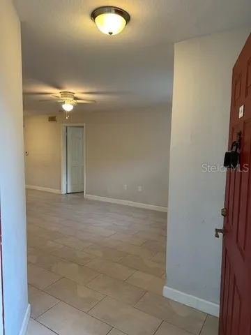 a view of a room with a door