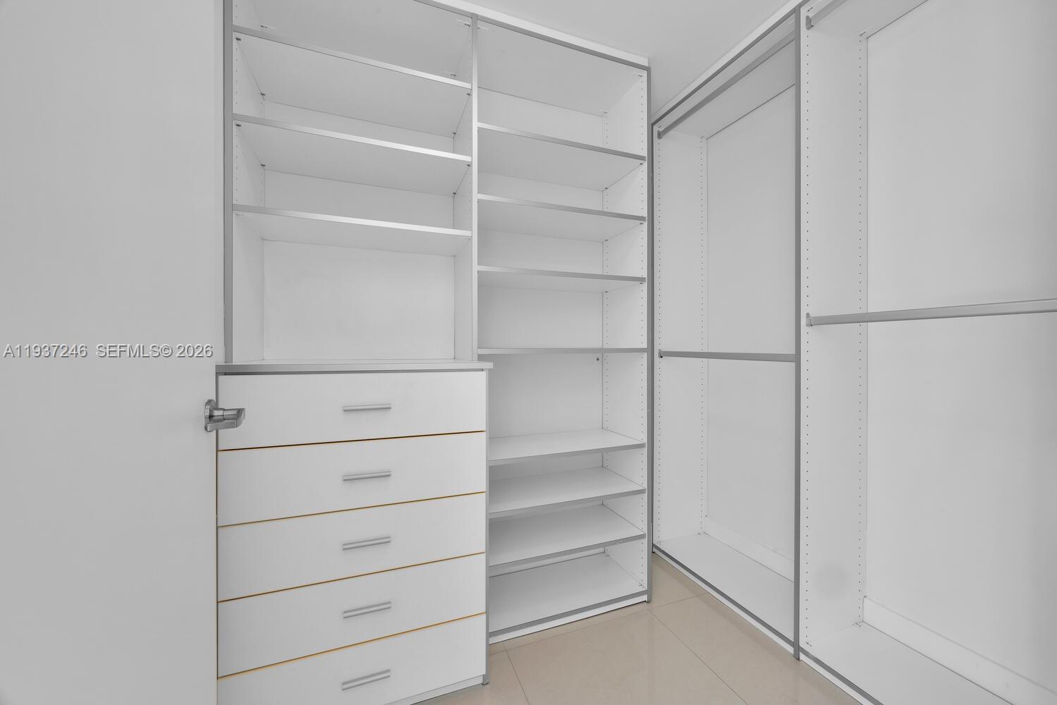 92 Southwest 3rd Street, Unit 3904 Miami, FL 33130 - Photo 15 of 23 a view of walk in closet