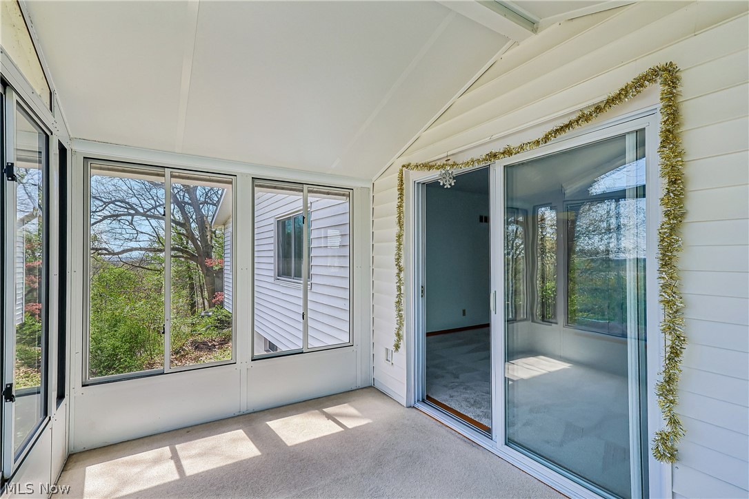 2060 6th Street Southwest Akron, OH 44314 - Photo 11 of 46 Sun room with slider into living room