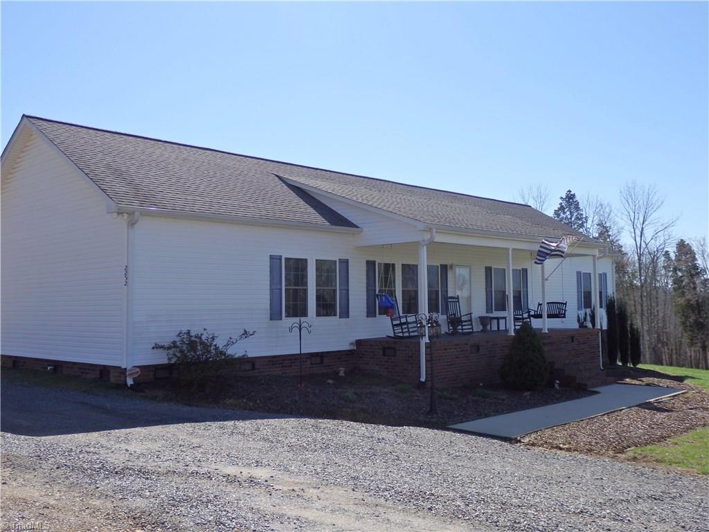 2252 Ross Wood Road Trinity, NC 27370 - Photo 2 of 30 Front with concrete walk and covered, concrete porch