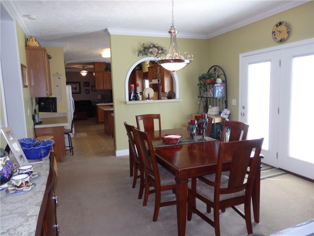 2252 Ross Wood Road Trinity, NC 27370 - Photo 13 of 30 dining room just off kitchen with door to deck