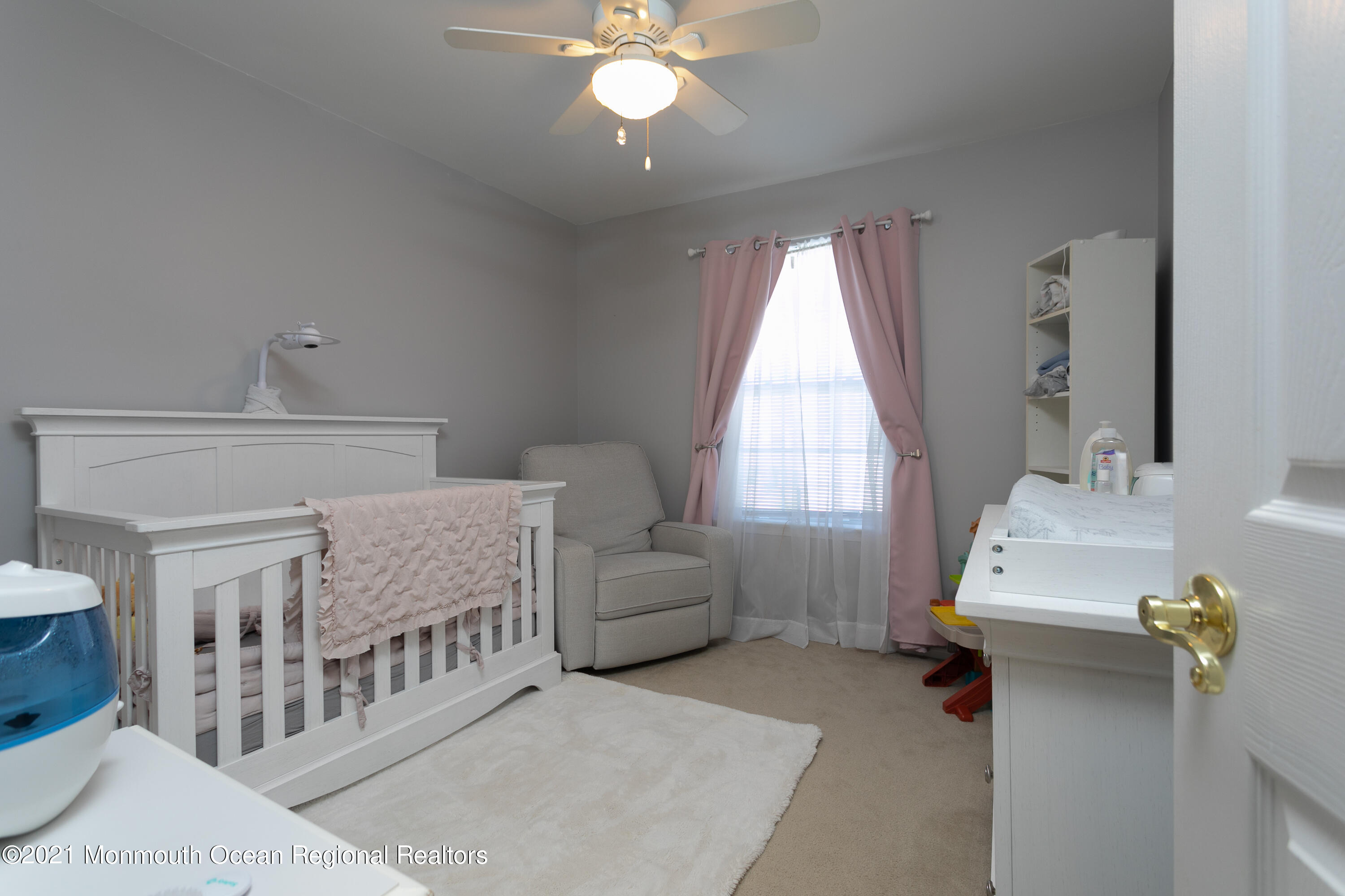 129 Cruise Road Manahawkin, NJ 08050 - Photo 22 of 29 a living room with furniture and a window