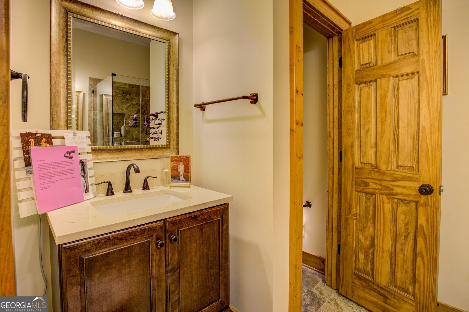 2049 Midway Church Road Newborn, GA 30056 - Photo 43 of 71 a bathroom with a sink and a mirror