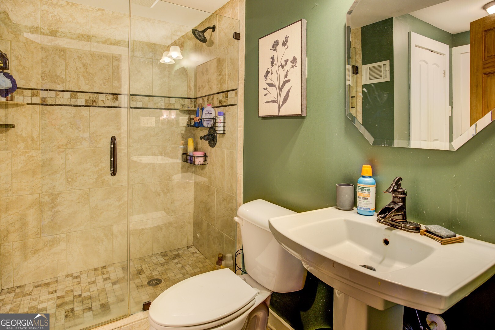 2049 Midway Church Road Newborn, GA 30056 - Photo 48 of 71 a bathroom with a sink toilet and shower