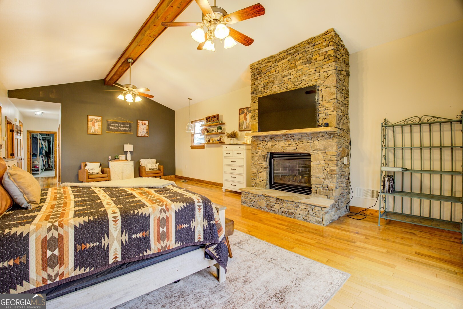 2049 Midway Church Road Newborn, GA 30056 - Photo 56 of 71 a bedroom with a bed and a fireplace