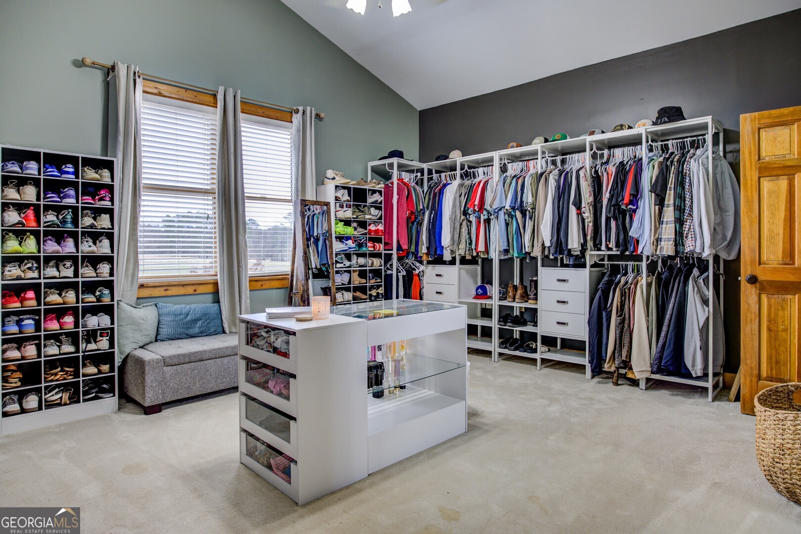 2049 Midway Church Road Newborn, GA 30056 - Photo 61 of 71 a view of walk in closet with clothes and shoes