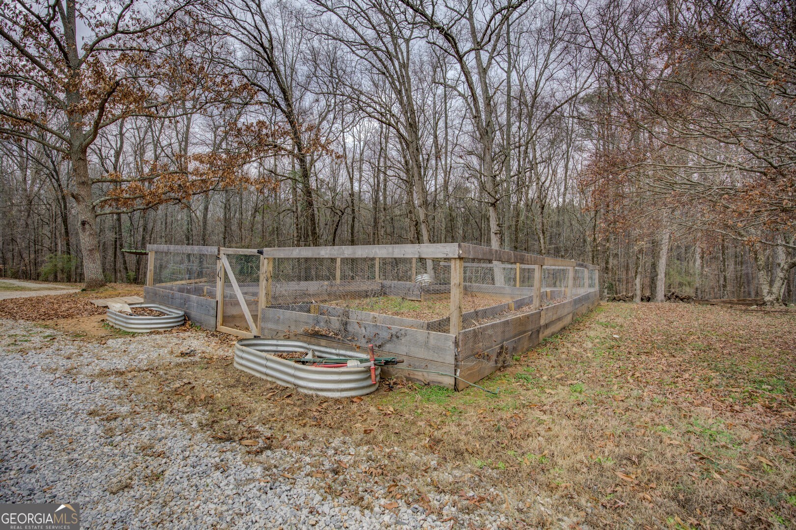 2049 Midway Church Road Newborn, GA 30056 - Photo 71 of 71 a view of a backyard with wooden fence