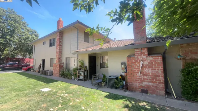 a front view of a house with patio
