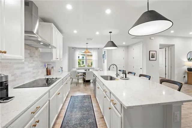 $590,000 | 4688 Arboretum Circle, Unit 101, Naples, FL 34112