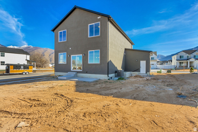 529 North Hvn Drive Mapleton, UT 84664 - Photo 30 of 30 Rear view of property featuring a mountain view and stucco siding