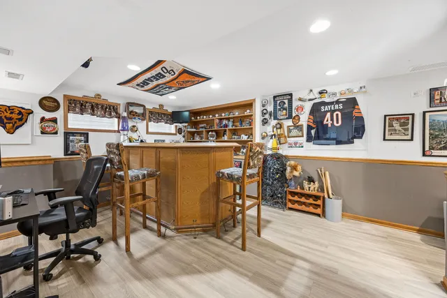 a view of a workspace with furniture and toys