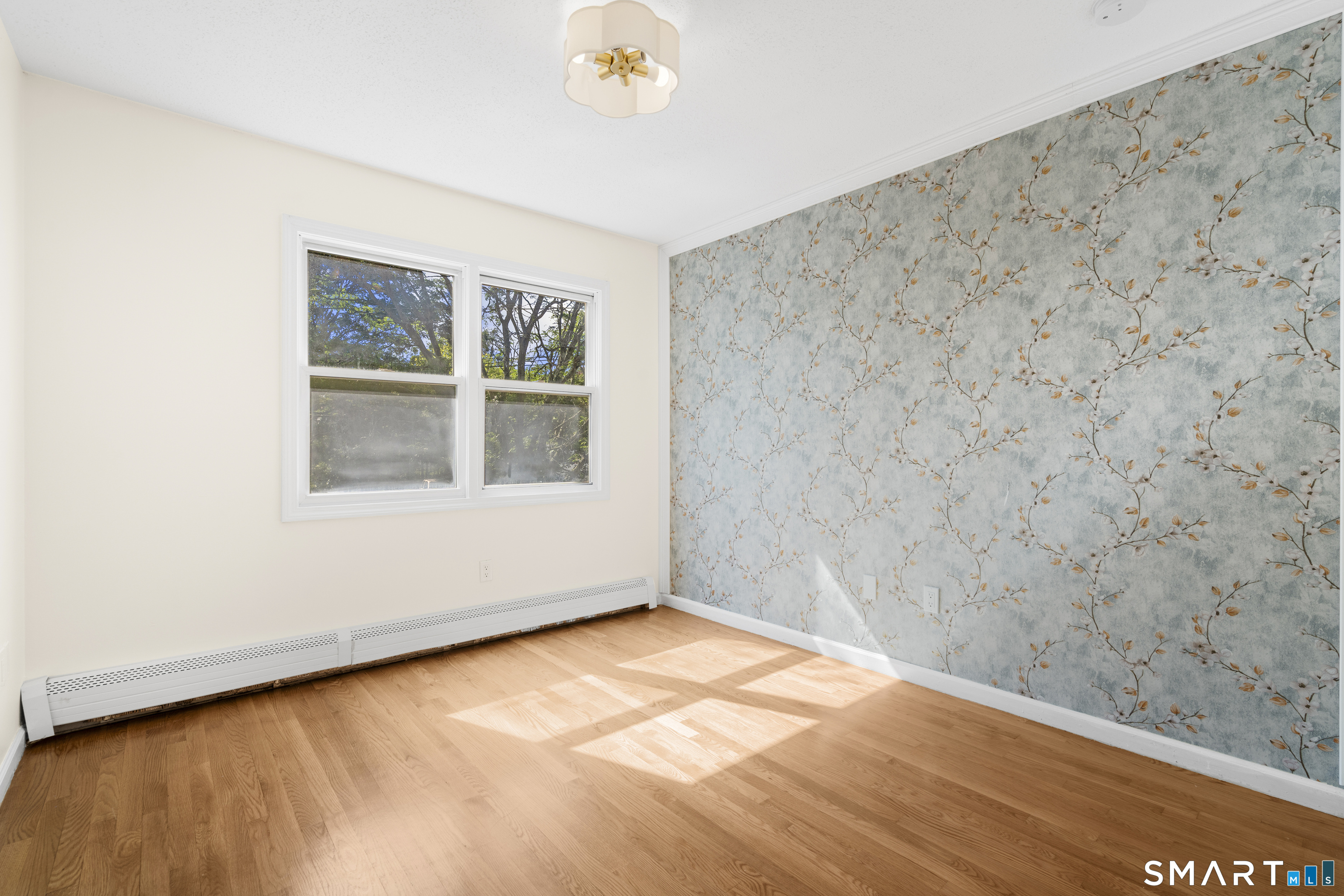 39 Joseph Lane Hamden, CT 06514 - Photo 18 of 40 a view of an empty room with a window
