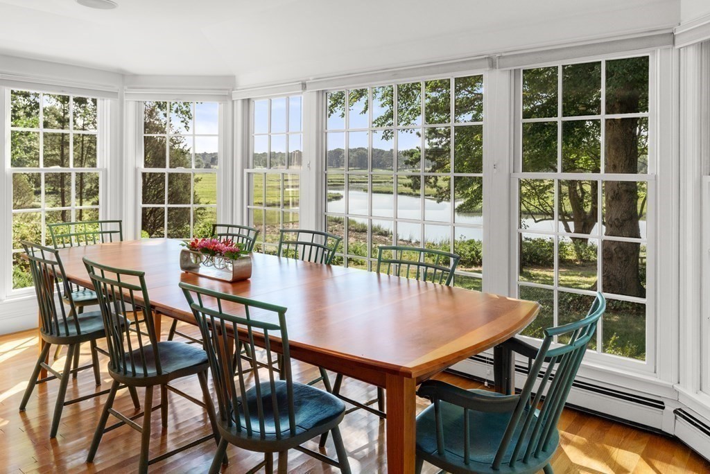 34 Sunset Road Duxbury, MA 02332 - Photo 14 of 42 a view of a dining room with furniture and wooden floor