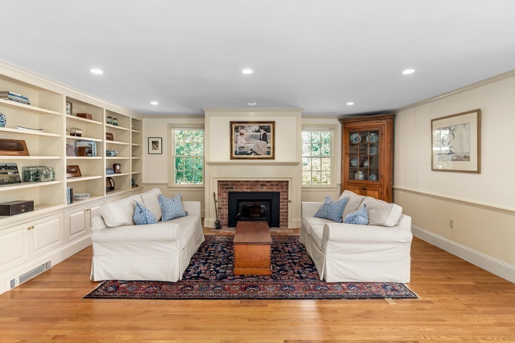 34 Sunset Road Duxbury, MA 02332 - Photo 17 of 42 a living room with furniture and a fireplace