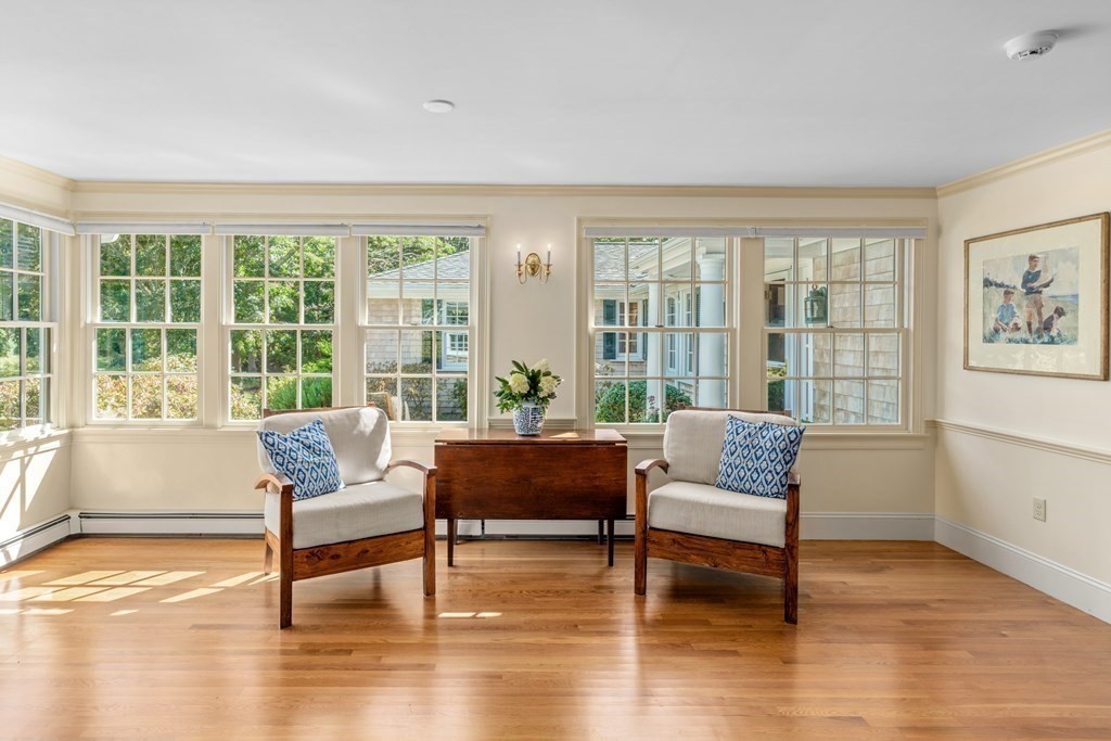 34 Sunset Road Duxbury, MA 02332 - Photo 18 of 42 a living room with furniture and a large window