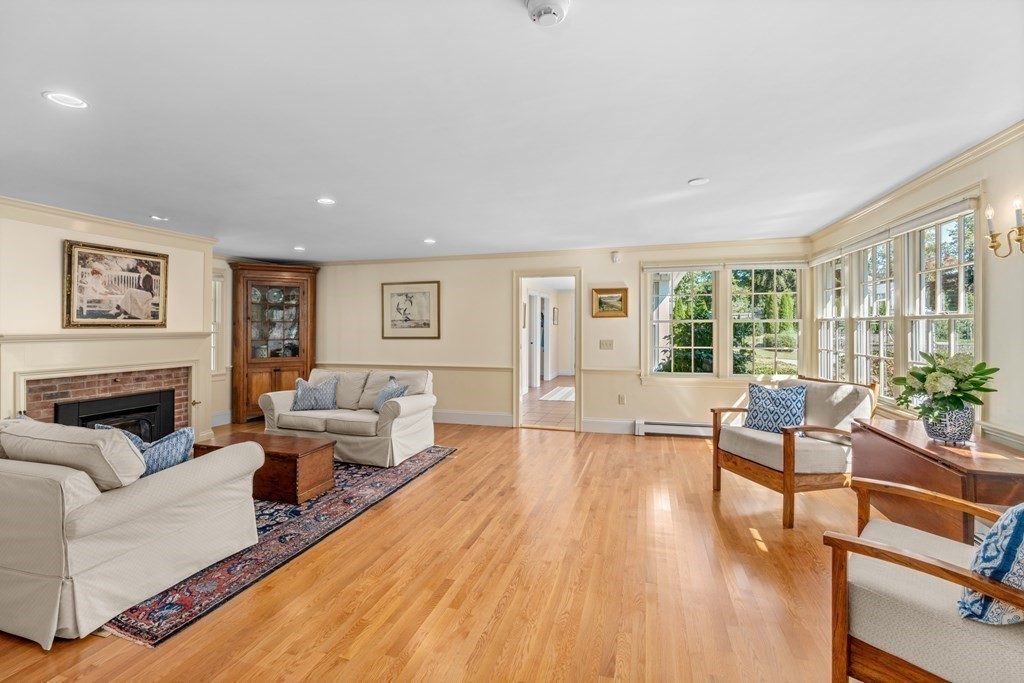 34 Sunset Road Duxbury, MA 02332 - Photo 19 of 42 a living room with furniture and a fireplace
