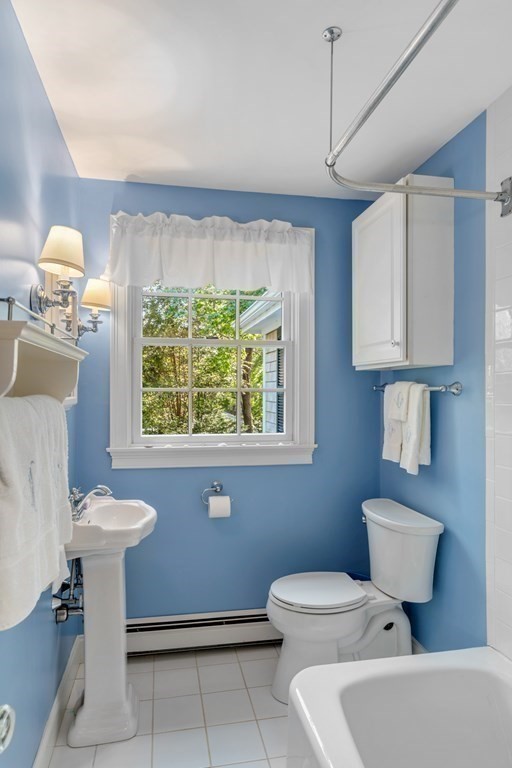 34 Sunset Road Duxbury, MA 02332 - Photo 28 of 42 a bathroom with a toilet sink and mirror