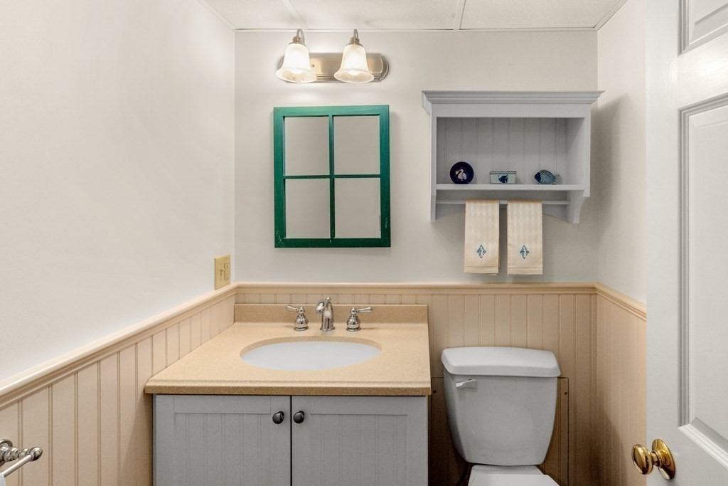 34 Sunset Road Duxbury, MA 02332 - Photo 31 of 42 a bathroom with a toilet sink and mirror