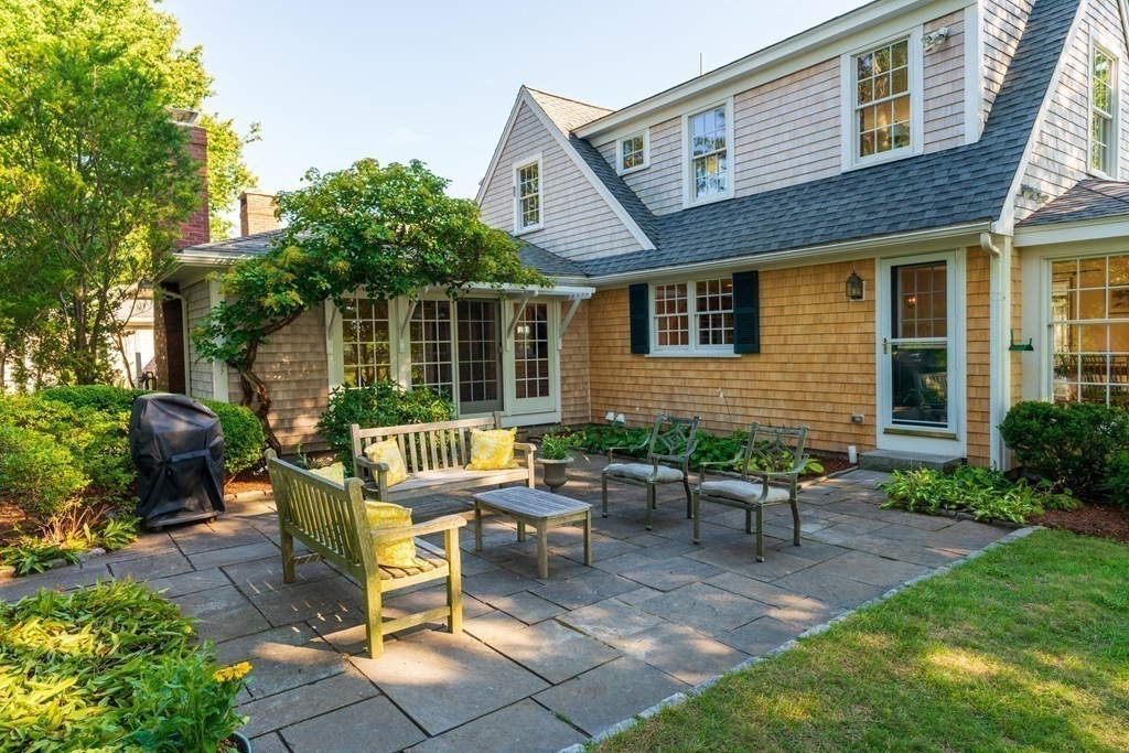 34 Sunset Road Duxbury, MA 02332 - Photo 36 of 42 a view of a house with backyard sitting area and garden