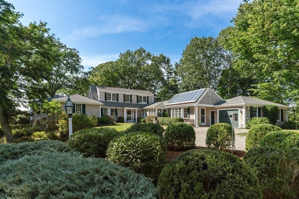 34 Sunset Road Duxbury, MA 02332 - Photo 6 of 42 a front view of a house with a yard