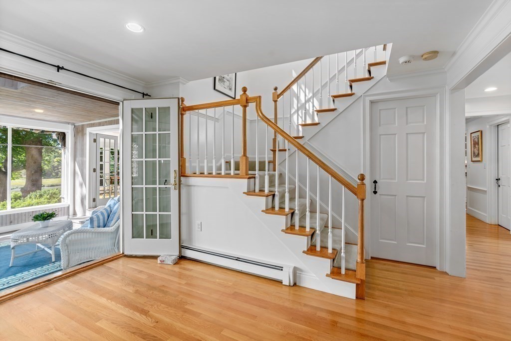 34 Sunset Road Duxbury, MA 02332 - Photo 8 of 42 a view of entryway with wooden floor and door