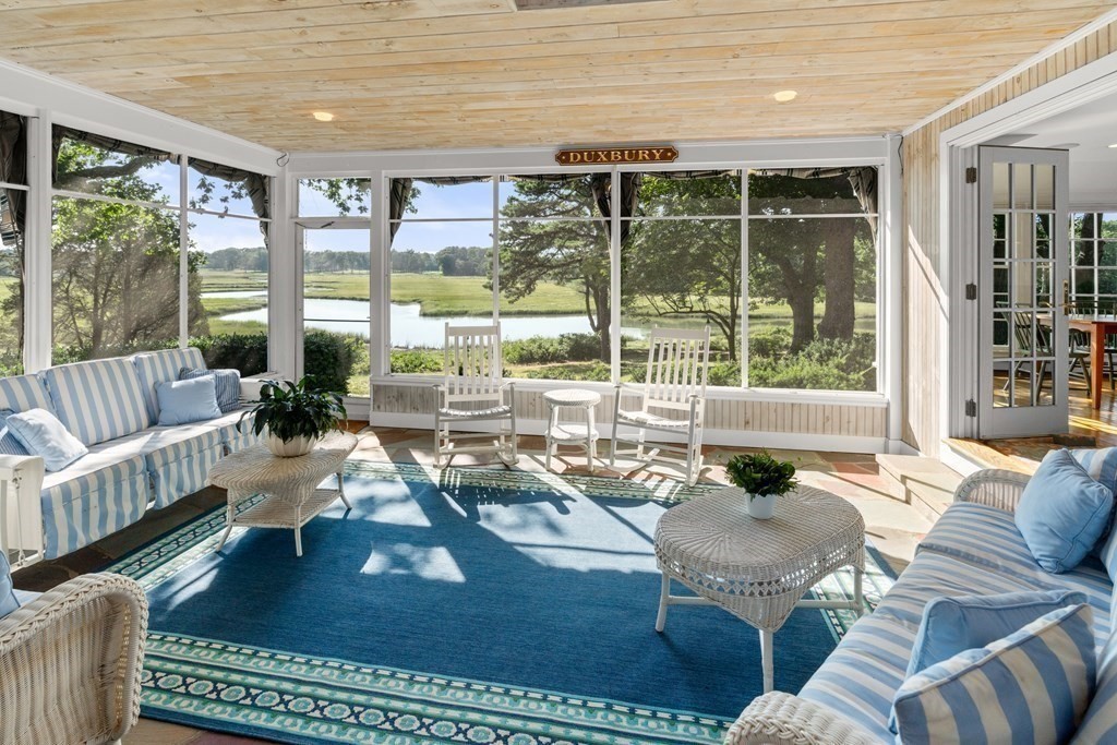 34 Sunset Road Duxbury, MA 02332 - Photo 9 of 42 a living room with furniture and a large window