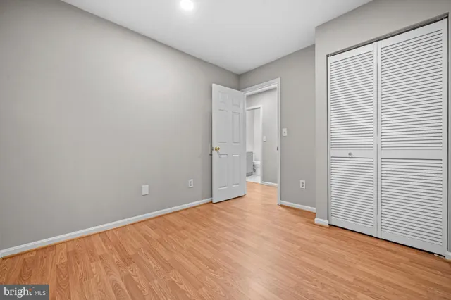 a bathroom with a sink toilet and mirror