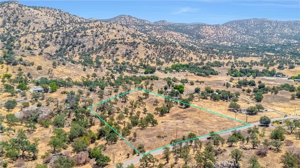 a view of outdoor space and covered with green space