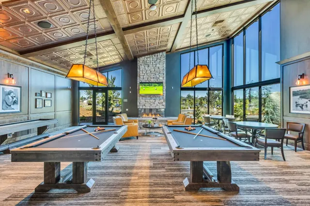 a front view of a yard with table and chairs