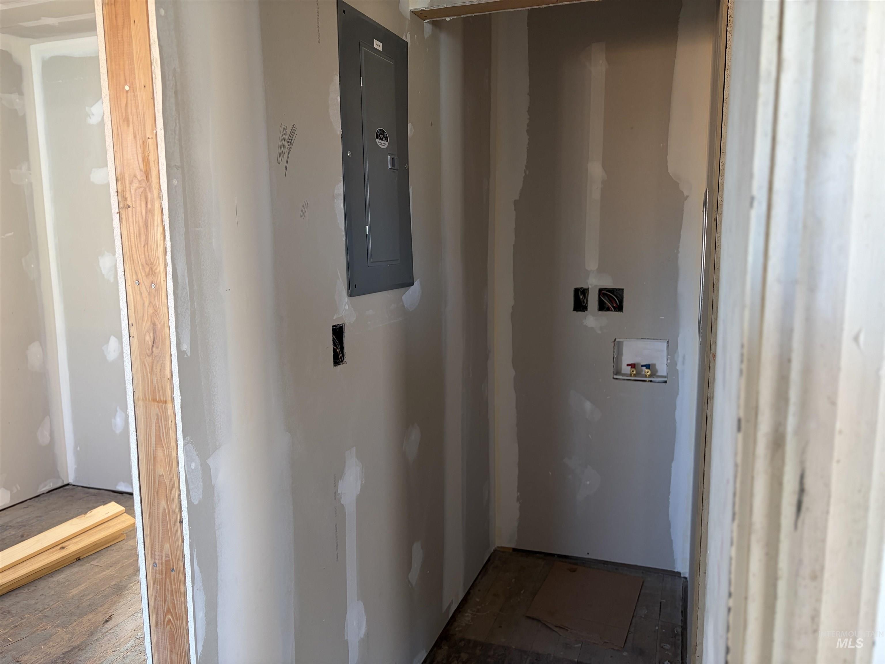 308 East Park Street Weiser, ID 83672 - Photo 22 of 50 Laundry room featuring electric panel and hookup for a washing machine