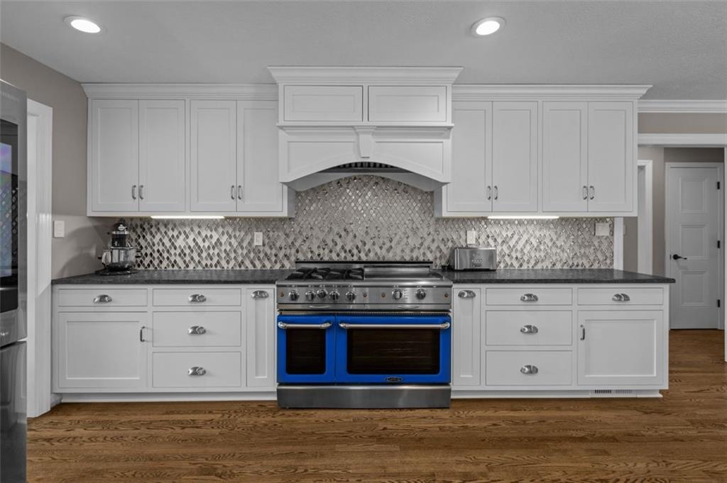 809 Timber Trail Oakdale, PA 15071 - Photo 12 of 50 a kitchen with granite countertop white cabinets and stainless steel appliances