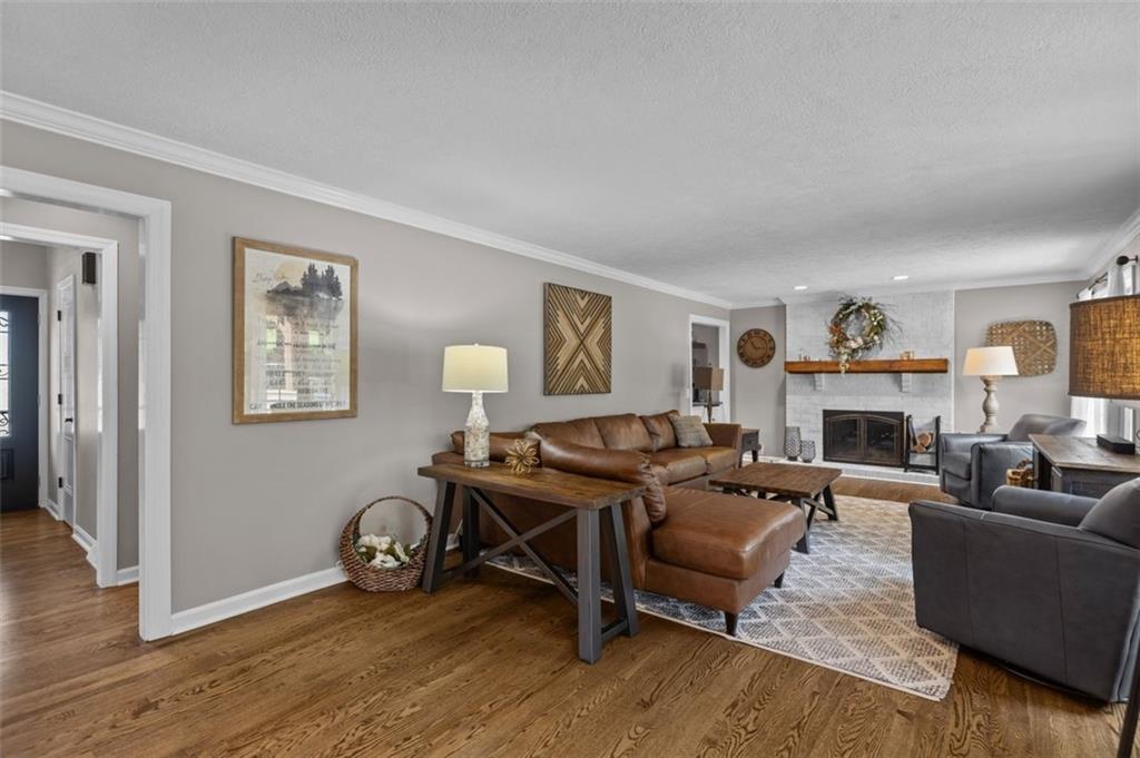 809 Timber Trail Oakdale, PA 15071 - Photo 15 of 50 a living room with furniture and a fireplace