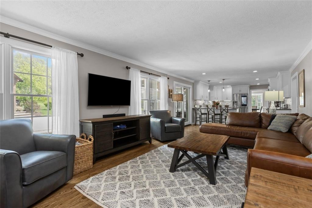809 Timber Trail Oakdale, PA 15071 - Photo 17 of 50 a living room with furniture and a flat screen tv