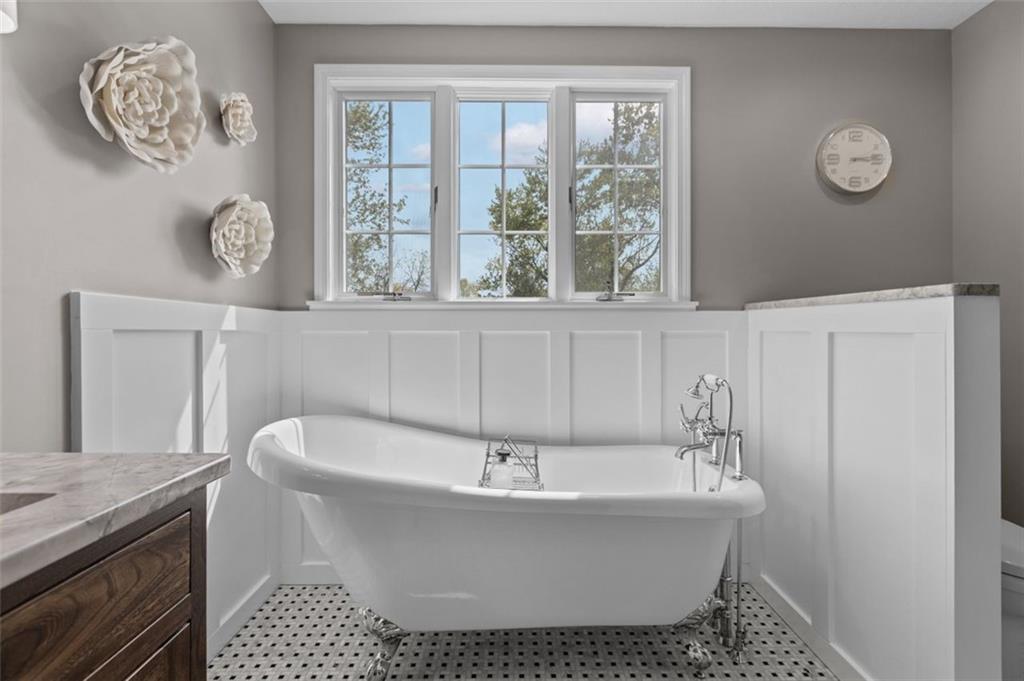 809 Timber Trail Oakdale, PA 15071 - Photo 31 of 50 a white bath tub sitting next to a window