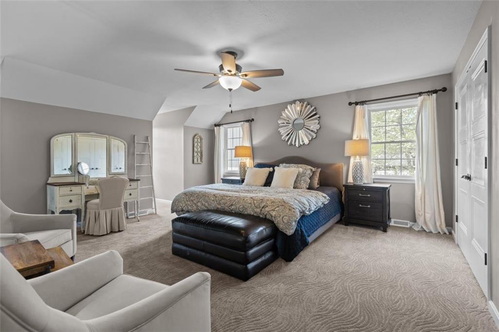 809 Timber Trail Oakdale, PA 15071 - Photo 32 of 50 a bedroom with a bed a couch and dresser