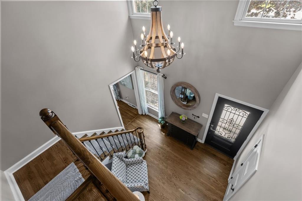 809 Timber Trail Oakdale, PA 15071 - Photo 37 of 50 a view of a hallway with windows and wooden floor