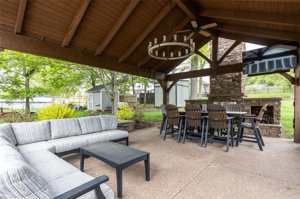 809 Timber Trail Oakdale, PA 15071 - Photo 42 of 50 a view of a chairs and a table in a patio