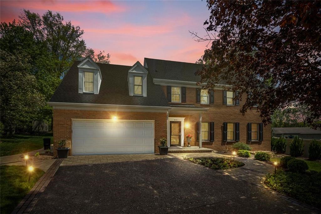 809 Timber Trail Oakdale, PA 15071 - Photo 50 of 50 a front view of a house with a yard and garage