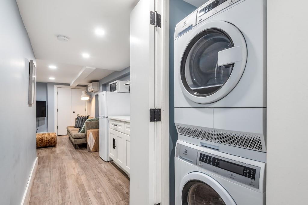 1712 Dekalb Avenue Brooklyn, NY 11237 - Photo 13 of 17 a view of a hallway with washer and dryer