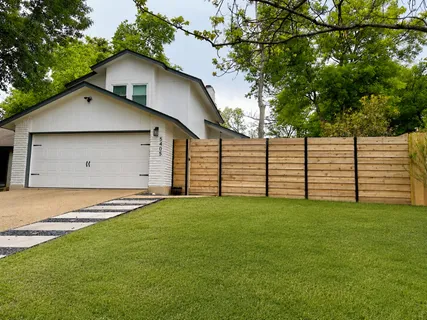 a view of a backyard with a garden