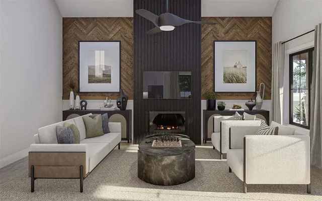 a living room with furniture and a fireplace