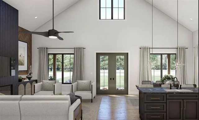 a living room with furniture a ceiling fan and a window