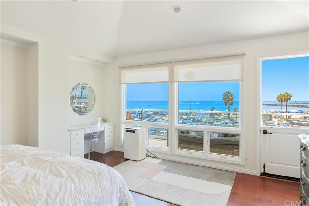 3036 Breakers Drive Corona del Mar, CA 92625 - Photo 1 of 48 a bedroom with a bed and a window