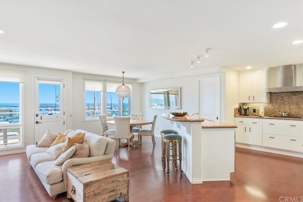 3036 Breakers Drive Corona del Mar, CA 92625 - Photo 15 of 48 a living room with furniture and a wooden floor