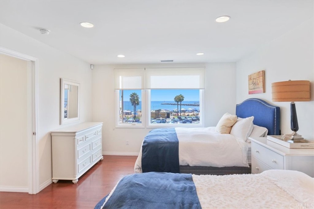 3036 Breakers Drive Corona del Mar, CA 92625 - Photo 18 of 48 a bedroom with furniture and a couch