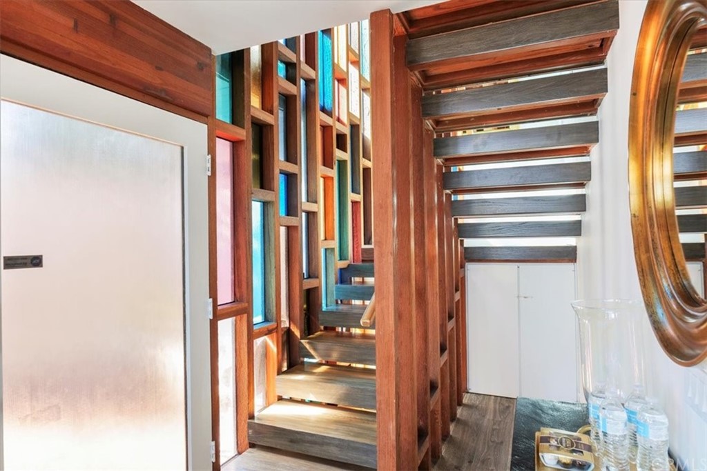 3036 Breakers Drive Corona del Mar, CA 92625 - Photo 47 of 48 a view of walk in closet with clothes and shoes