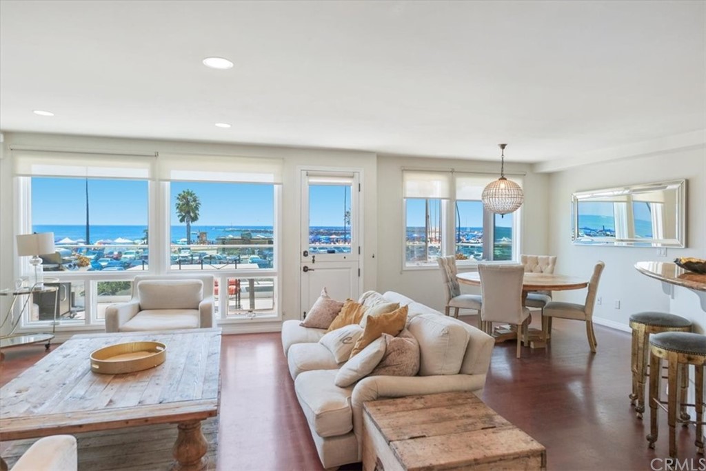 3036 Breakers Drive Corona del Mar, CA 92625 - Photo 9 of 48 a living room with furniture and a wooden floor