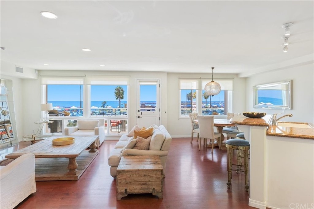 3036 Breakers Drive Corona del Mar, CA 92625 - Photo 10 of 48 a living room with lots of furniture and view of kitchen