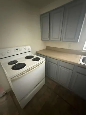 a bathroom with a sink and vanity