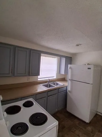 a utility room with washer and dryer
